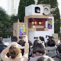 A marionette clock featuring Doraemon is revealed at a ceremony for the popular cartoon character\'s 50th anniversary since it was serialized in a magazine, in Tokyo\'s Odaiba waterfront area on Friday. | KYODO