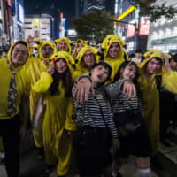A group of Halloween revelers, many dressed as Pikachu, hit Shibuya\'s streets Thursday. | KENDREA LIEW