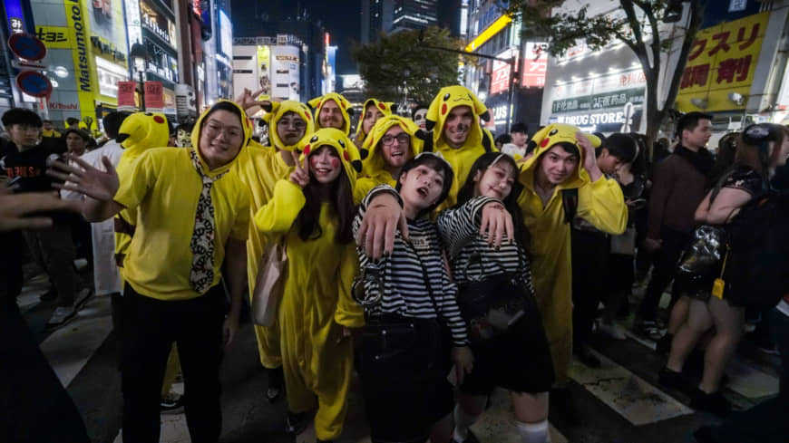A group of Halloween revelers, many dressed as Pikachu, hit Shibuya's streets Thursday. | KENDREA LIEW