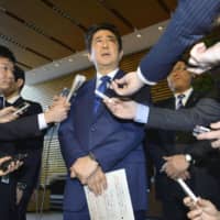 Prime Minister Shinzo Abe speaks to reporters after holding a National Security Council meeting at the Prime Minister\'s Office in Tokyo in April 2017. | KYODO