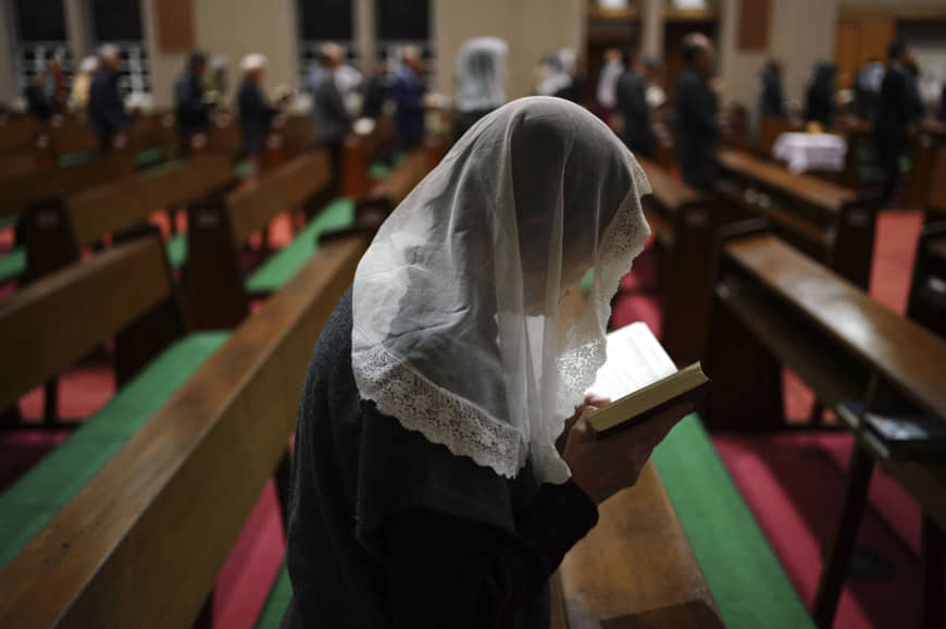 Worshipers attend an early morning Mass at the Urakami Cathedral in the city of Nagasaki on Nov. 17.  | AP