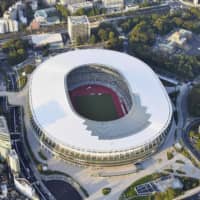 The new National Stadium is shown in Tokyo\'s Shinjuku Ward in September. Officials from the Tokyo Metropolitan Government revealed Friday that the remains of at least 187 people dating back to the early 1900s or before were retrieved from the Olympic site before construction began. | KYODO