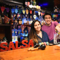 There\'s no place like home: Natsumi Vanessa Hernandez and Yusei Maeda wanted to create a place for the small Latin American community in Fukuoka to flourish, but they learned that salsa knows no borders when it comes to popularity. | IRINA GRIGOROVICI