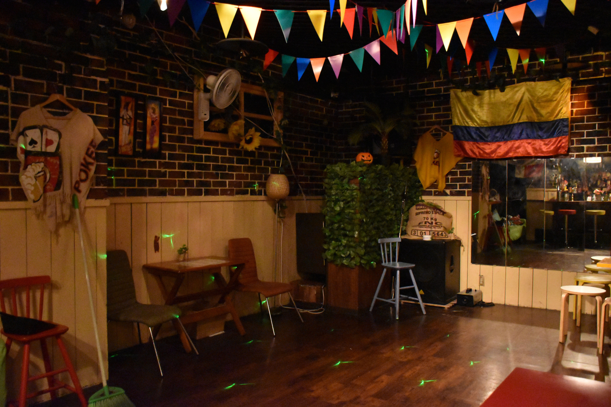 Hit the dance floor: A Colombian flag hangs on the wall of Latin Bar Salsa in Fukuoka's Tenjin neighborhood. | IRINA GRIGOROVICI
