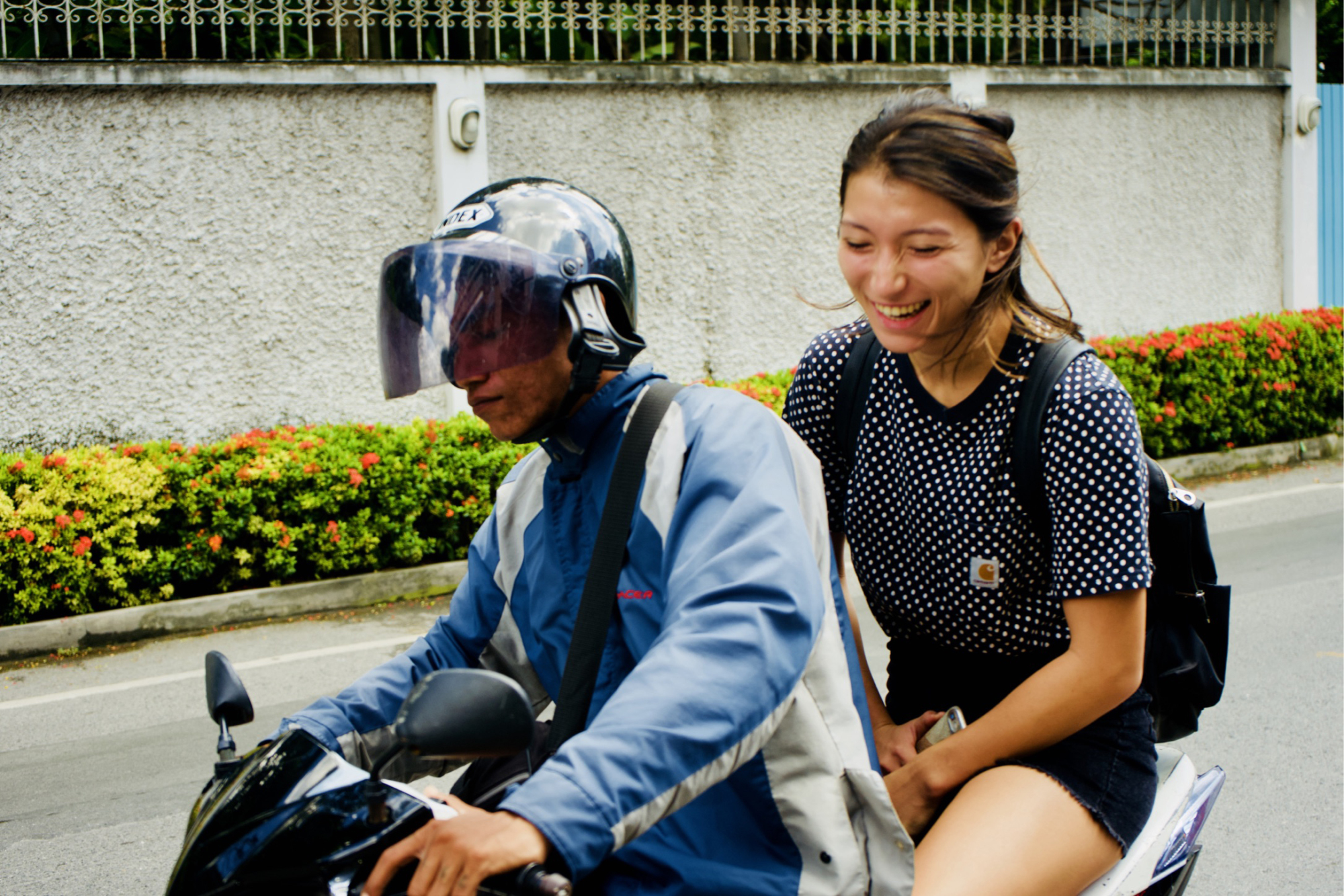 Daily necessity: Beat the notorious Bangkok traffic by riding a moto taxi around the city. The drivers are skilled, and cut through the traffic by alarmingly narrow margins. | OSCAR BOYD