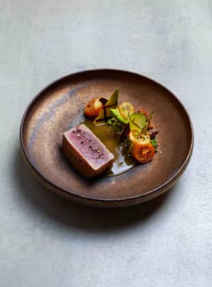 Pret-a-porter deluxe: A dish of tuna, avocado and kumquat from Esterre's menu, designed by French chef Alain Ducasse. | COURTESY OF ESTERRE