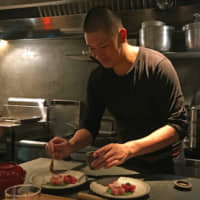 Small is bountiful: Working from a tiny open kitchen, Hideaki Sakai offers an extensive menu, including quality seafood from his native Kyushu. | ROBBIE SWINNERTON