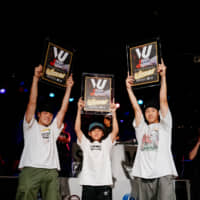 From left: Yoshiki Tomiyama, Tsukki Iinuma and Sho Sato celebrate after winning a chance to represent Japan at the 22nd Pessac Battle Arena break-dancing tournament in France. | DAN SZPARA