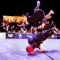 Sho Sato (above) and Tsukki Iinuma compete at the 22nd Pessac Battle Arena break-dancing competition in November. | COURTESY OF VIBRATIONS URBAINES / PESSAC BATTLE ARENA