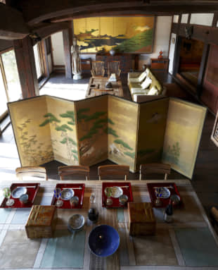 Statement piece: Among the quintessential motifs of traditional Japanese paintings are combinations of auspicious symbols such as the pine, bamboo and plum, or the crane and tortoise, as well as the juxtaposition of white sand and green pines. Here a medium six-panel folding screen from the Edo Period (1603-1868) featuring bamboo, pine trees and cranes casually divides a large room into living and dining spaces.