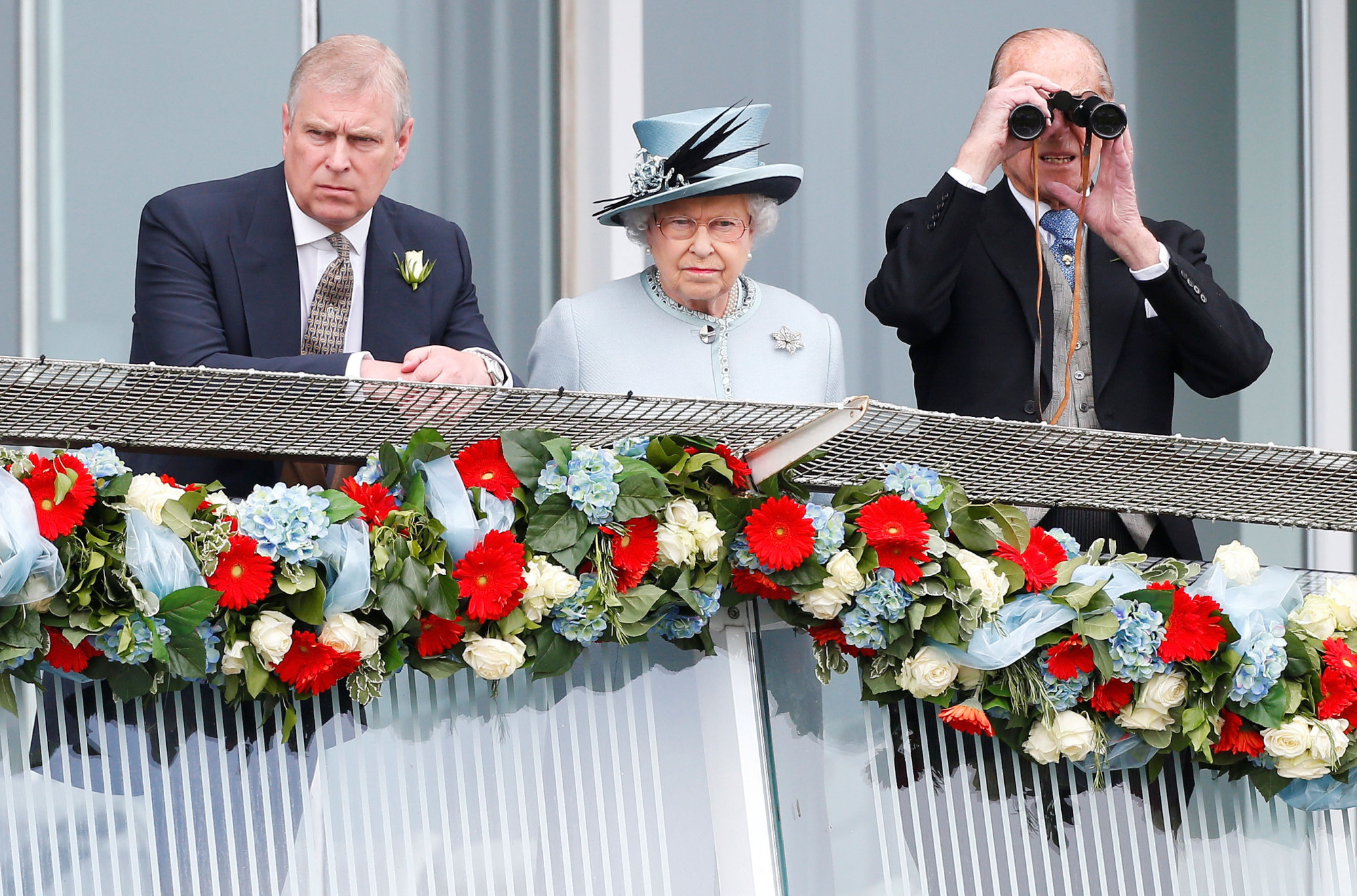 Prince Andrew (left) stepped down from his royal duties last Wednesday with the approval of his mother, Queen Elizabeth II (center) after a disastrous interview in which he tried to justify his well-documented ties to convicted sex offender Jeffrey Epstein. | REUTERS