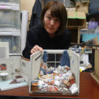 Miyu Kojima presents some of her dioramas inspired by rooms that she has helped clean for ToDo-Company. | ALEX MARTIN