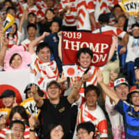 Fans feel the spirit at the Scotland-Japan match on Oct. 13.  | DAN ORLOWITZ
