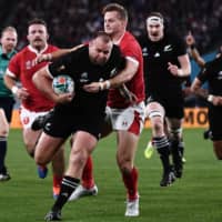 New Zealand\'s Joe Moody scores a try against Wales in the first half. | AFP-JIJI