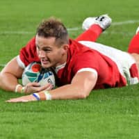 Hallam Amos scores Wales\' first try in the 19th minute. | AFP-JIJI