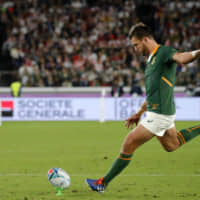 South Africa\'s Handre Pollard kicks a penalty in the first half of the Rugby World Cup final on Saturday. | AP