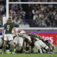 Referee Jerome Garces resets a scrum during the Rugby World Cup final. | AP