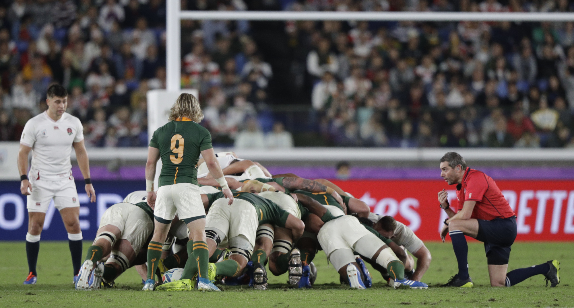Referee Jerome Garces resets a scrum during the Rugby World Cup final. | AP