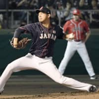 Japan southpaw starter Shota Imanaga pitches against Canada in an exhibition game on Friday night at Okinawa Cellular Field. Japan defeated Canada 3-0. | KYODO