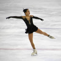 Mana Kawabe performs her free skate at the Japan Junior Championships on Sunday in Yokohama. Kawabe won the women\'s competition with a total score of 193.57. | RISA TANAKA