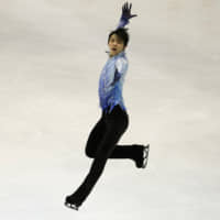 Yuzuru Hanyu performs in the men\'s short program during the NHK Trophy in Sapporo on Friday. | AP