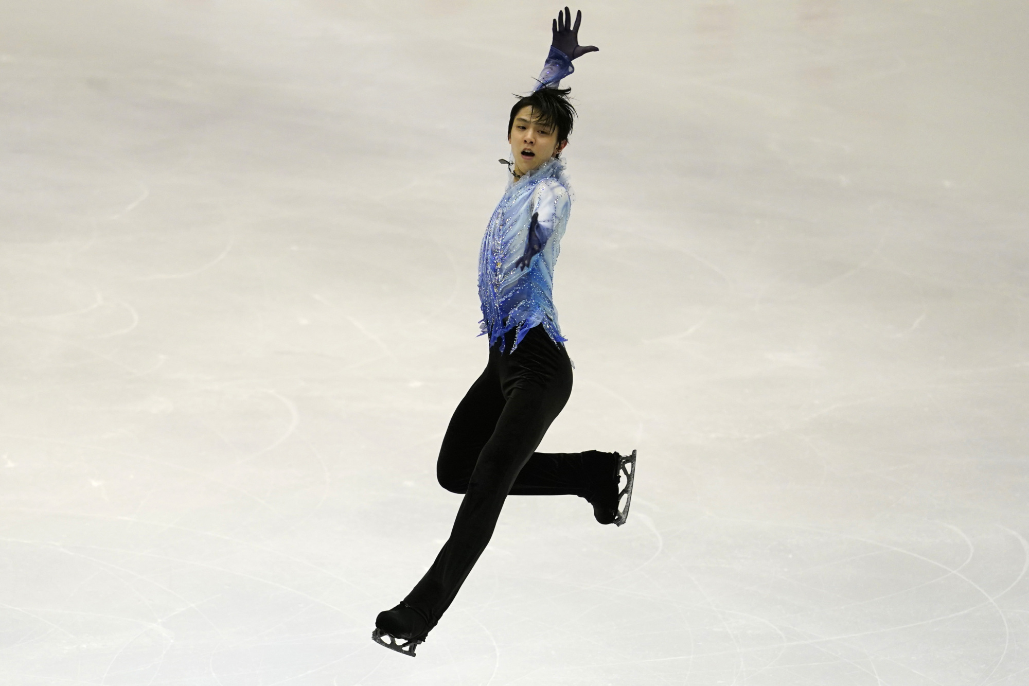 Yuzuru Hanyu performs in the men's short program during the NHK Trophy in Sapporo on Friday. | AP