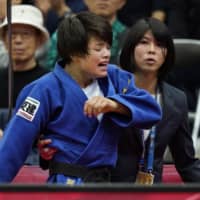 Uta Abe reacts after losing the women\'s 52-kg final of the Osaka Grand Slam on Friday at Maruzen Intec Arena Osaka. | KYODO