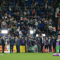 Television crews broadcast from the pitch before the Rugby World Cup final between England and South Africa on Saturday at International Stadium Yokohama. | DAN ORLOWITZ