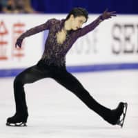 Yuzuru Hanyu performs in the men\'s free program en route to winning the NHK Trophy on Saturday night in Sapporo. He won the title by more than 55 points. | KYODO