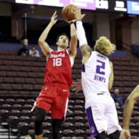 Yuta Watanabe of the Memphis Hustle, seen shooting a jumper on Nov 15 against the Stockton Kings, is averaging 13.0 points per game through Monday. | KYODO / NBAE / VIA GETTY IMAGES