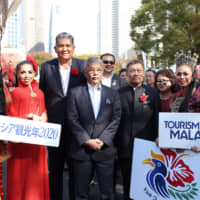 The Yang di-Pertuan Agong XVI, the King of Malaysia (fourth from left) and Secretary-General of the Ministry of Agriculture and Agro-Based Industry of Malaysia Dato\' Mohd Sallehhuddin Hassan (third from left) with the Ambassador of Malaysia to Japan Dato\' Kennedy Jawan (fifth from right) and his wife Datin Josephine Dagang (fourth from right), other ambassadors, politicians, businesspeople and festival participants during the opening ceremony for Malaysia Fair Tokyo 2019 at Shinjuku Chuo Park in Tokyo on Nov. 2. | PHOTO COURTESY OF MUHAMMAD AMIRUL AMIN ZAKARIA