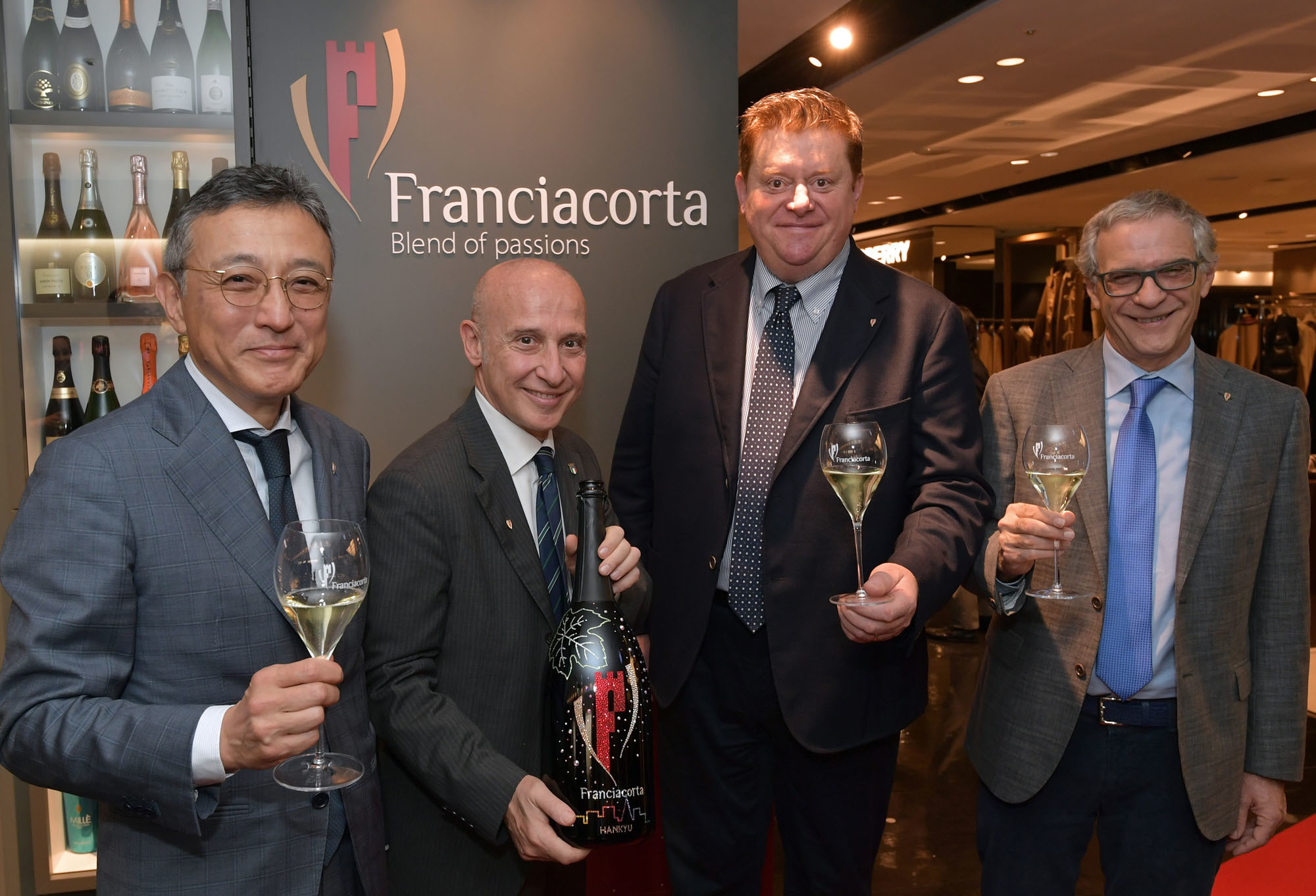 The new Chairman of the Franciacorta Association Silvano Brescianini (second from right) with, from left, Director and Managing Executive Officer of Hankyu Hanshin Department Store Co. Ltd.Norifumi Morii, Ambassador of Italy to Japan Giorgio Starace and Franciacorta Association CEO Giuseppe Salvioni during a ceremony to welcome the new chairman at Hankyu Men's Tokyo on Nov. 19. | YOSHIAKI MIURA