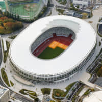 The Japan Sport Council said Tuesday that construction work on the new National Stadium, seen in Tokyo on Friday, has been completed after three years. It will be the main stadium for the 2020 Tokyo Olympics. | KYODO