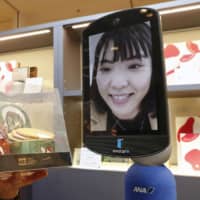 A shopping avatar robot is shown to the press by ANA Holdings Inc. on Wednesday in Tokyo. | ?¯