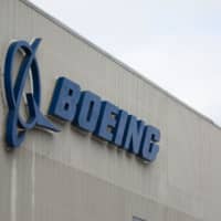 The Boeing logo is seen in March at the Boeing Renton Factory in Renton, Washington. Newly disclosed documents \"appear to point to a very disturbing picture\" about Boeing\'s response to safety issues regarding the 737 Max, a U.S. congressional aide told AFP on Tuesday. | AFP-JIJI