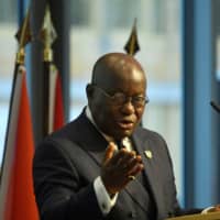 Ghana President Nana Akufo-Addo addresses participants of the \"G20 Investment Summit &#8212; German Business and the CwA Countries 2019\" on the sidelines of a Compact with Africa (CwA) in Berlin in November. | JOHN MACDOUGALL / POOL / VIA REUTERS