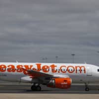 An Easyjet plane is seen at Lisbon\'s airport in 2016. | REUTERS