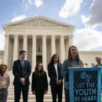 Kelsey Juliana, a lead plaintiff in Juliana v. United States, speaks during a news conference outside the Supreme Court in Washington on Sept. 18. | BLOOMBERG