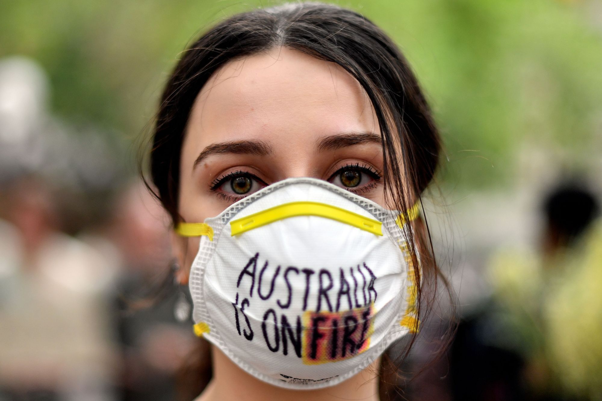 A demonstrator at a climate rally in Sydney on Wednesday | AFP-JIJI
