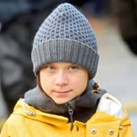 Climate change activist Greta Thunberg attends a Fridays for Future protest in Turin, Italy, on Dec. 13. | REUTERS