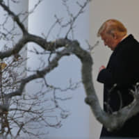 President Donald Trump leaves the Oval Office at the White House for a campaign trip to Battle Creek, Michigan, Wednesday in Washington. President Trump is on the cusp of being impeached by the House, with a historic debate Wednesday on charges that he abused his power and obstructed Congress ahead of votes that will leave a defining mark on his tenure at the White House. | AP