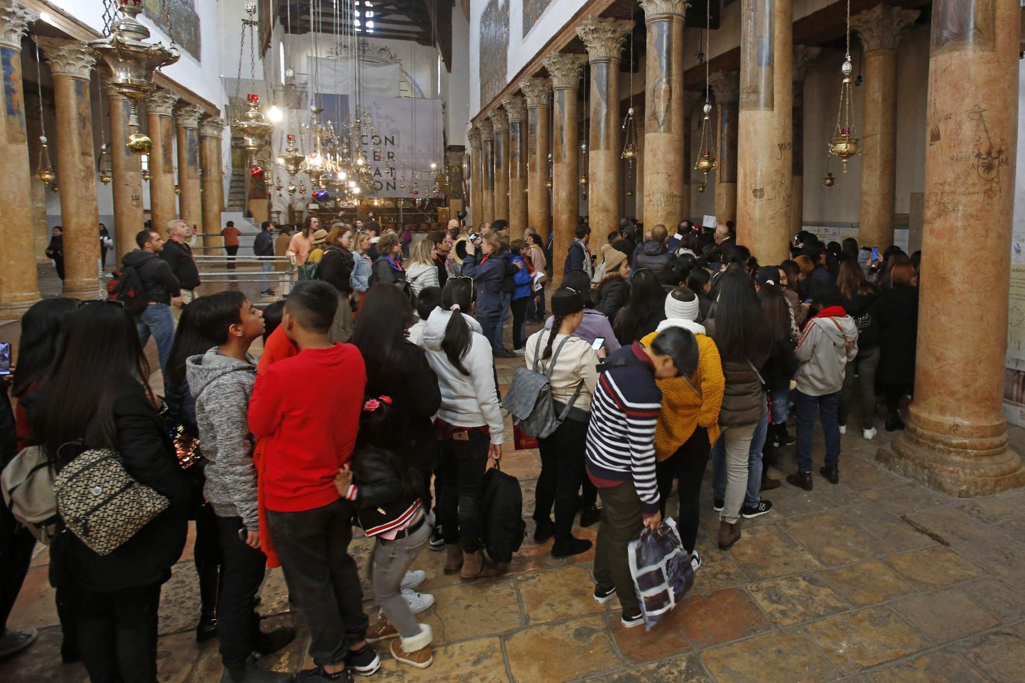 Israel reverses ban, letting Gaza Christians visit Christmas sites