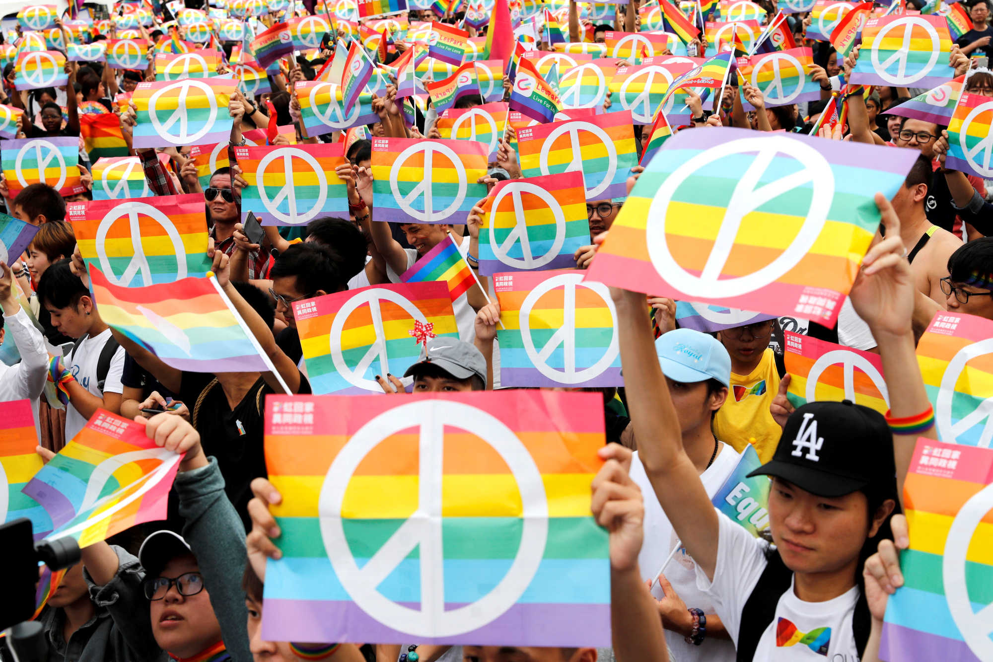 Same-sex marriage supporters take part in a lesbian, gay, bisexual and transgender pride parade in Kaohsiung, Taiwan, at the end of November last year after losing in a marriage equality referendum. | REUTERS