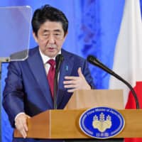 Prime Minister Shinzo Abe speaks at a news conference after holding talks with his Chinese and South Korean counterparts in Chengdu, China, last week. | KYODO