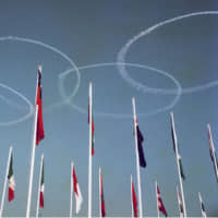Five Olympic circles drawn by the Air Self-Defense Force\'s Blue Impulse team are seen during the opening ceremony of the 1964 Tokyo Olympics. | KYODO