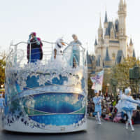 A parade featuring the animated movie \"Frozen\" is held at Tokyo Disneyland in Urayasu, Chiba Prefecture, in 2015. | KYODO