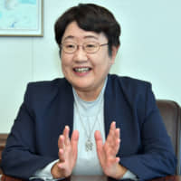 Shoko Sasaki, commissioner of the Immigration Services Agency, is interviewed at the Justice Ministry on Dec. 20. | YOSHIAKI MIURA