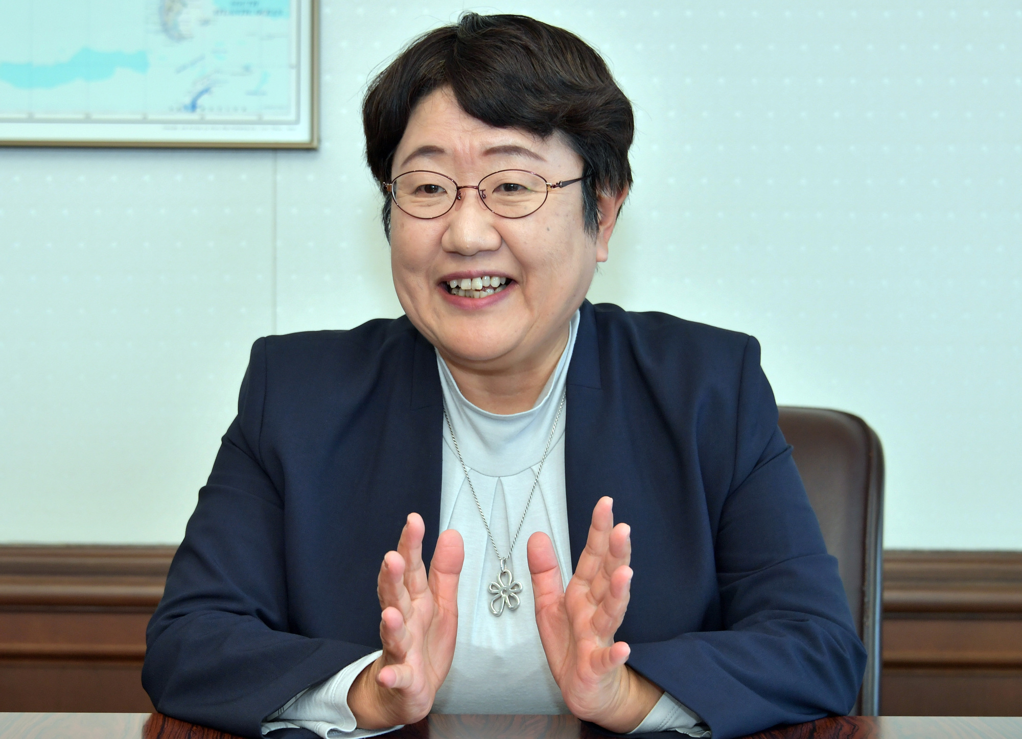 Shoko Sasaki, commissioner of the Immigration Services Agency, is interviewed at the Justice Ministry on Dec. 20. | YOSHIAKI MIURA