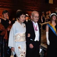Japanese chemist and co-laureate of the 2019 Nobel Prize in chemistry Akira Yoshino and his wife, Kumiko, arrive for a royal banquet to honor the laureates of the Nobel Prize 2019 following the Award ceremony on Tuesday in Stockholm. | AFP-JIJI
