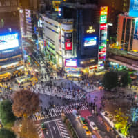 Be seen: Vloggers, Instagrammers and club kids flocked to Shibuya for a good time and the perfect selfie at Shibuya crossing. | GETTY IMAGES